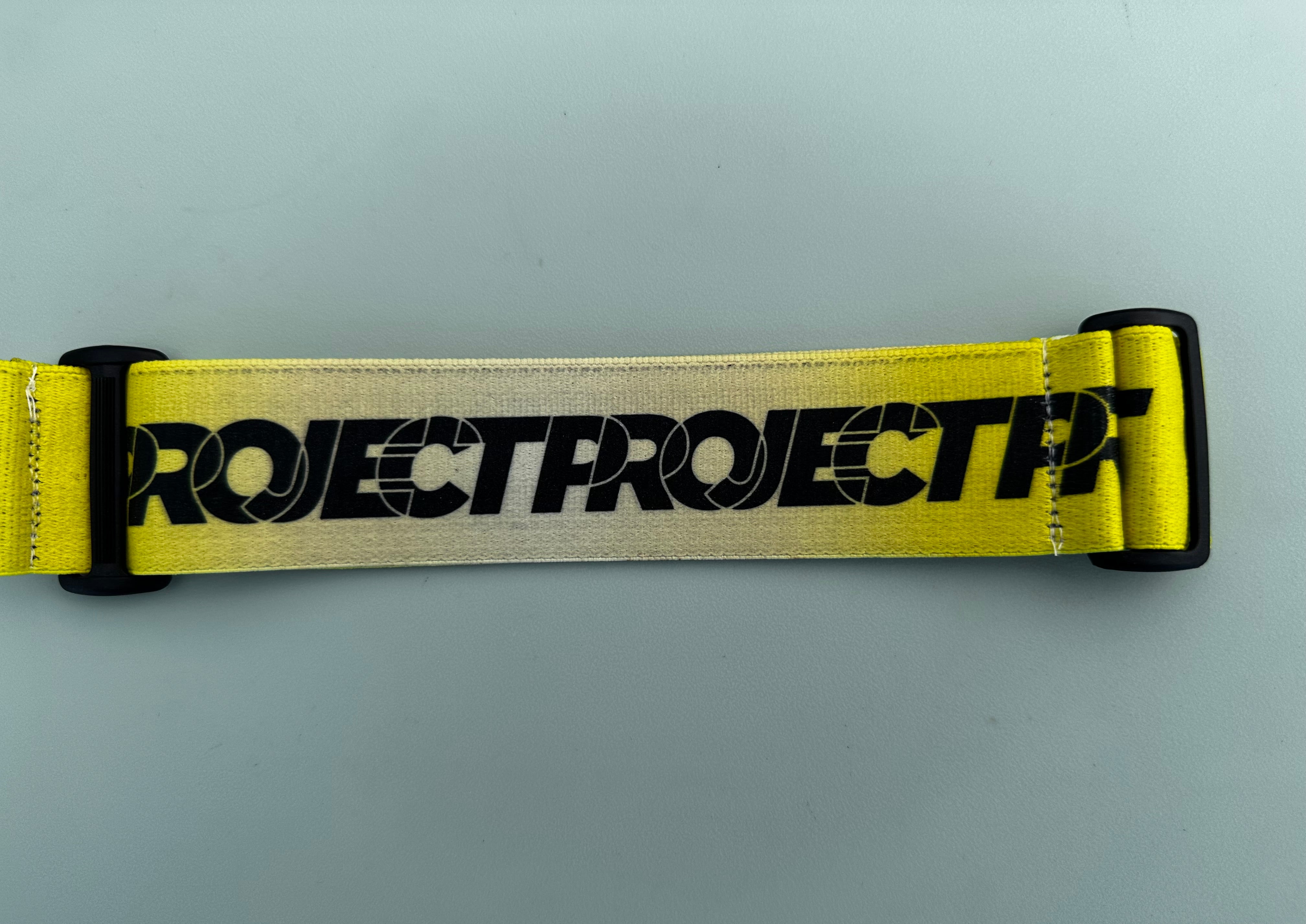 Secret Drop Project Repeating Logo Strap (Yellow/Gold/Black)