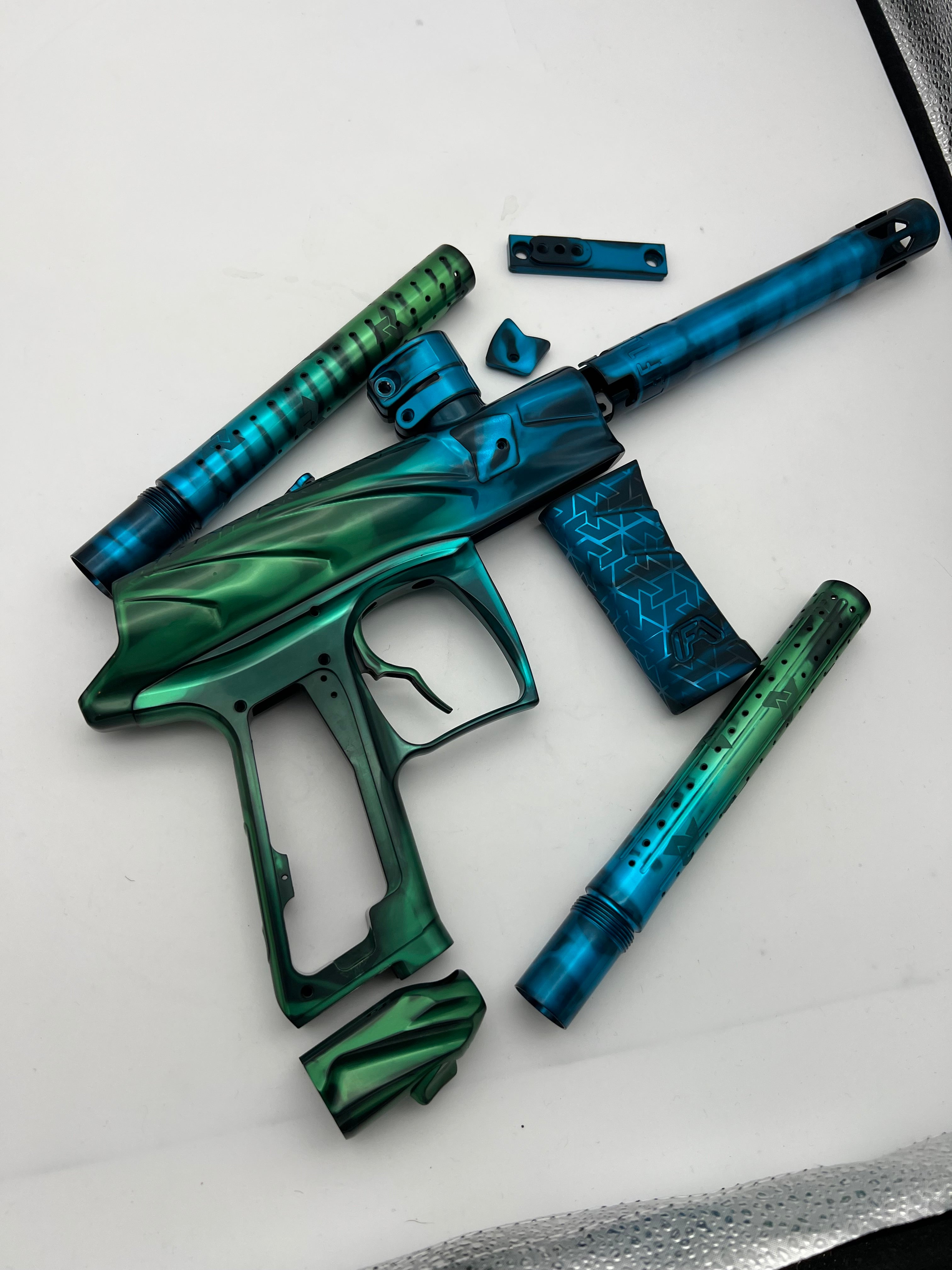 Tekniq Anodizing: Purple/Clear Homesis V2 & Blue/Green Project V2 Anodizing