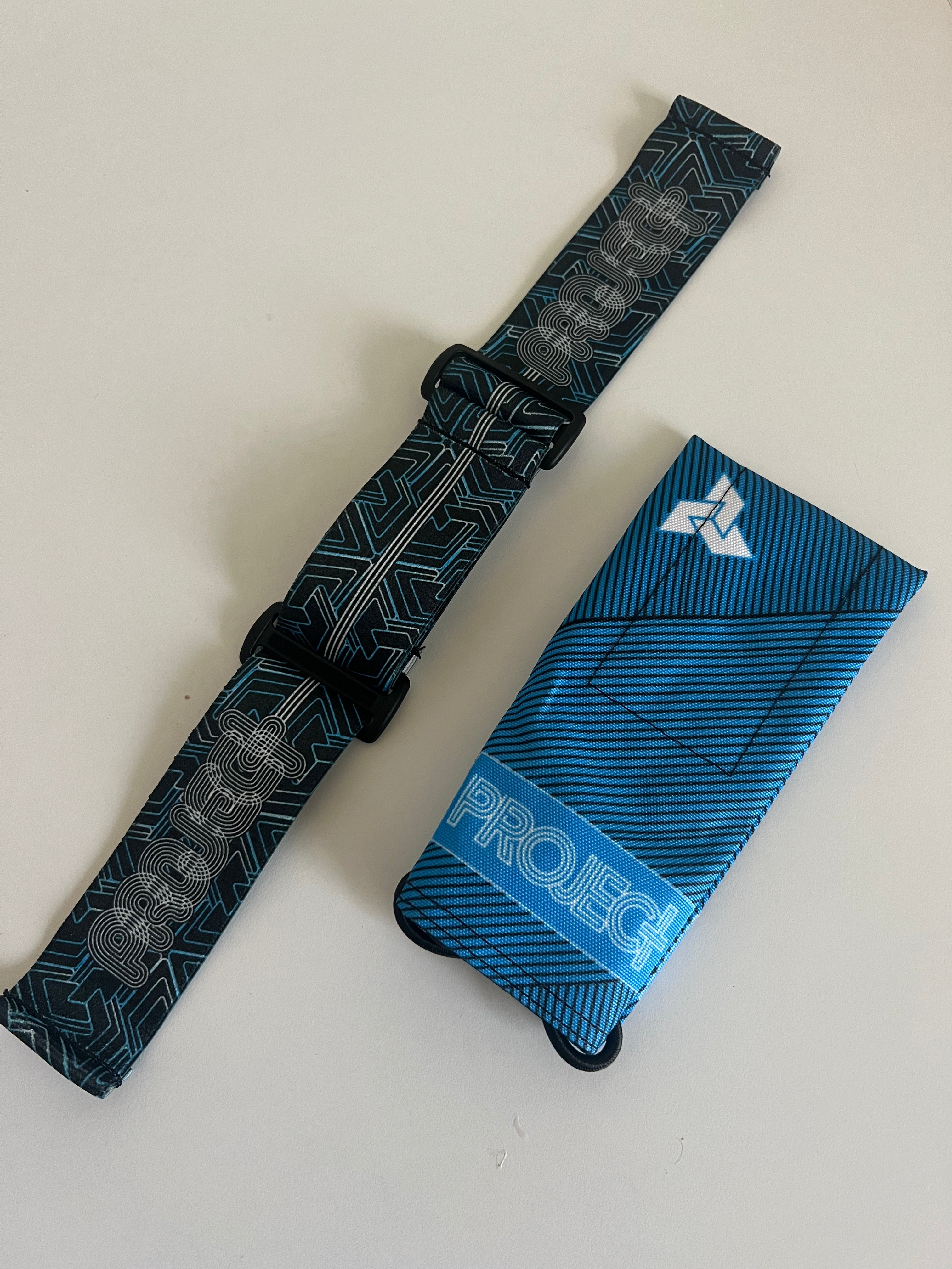 Secret drop, Blue Project Psychedelic Strap with Black/Gold Barrel bag